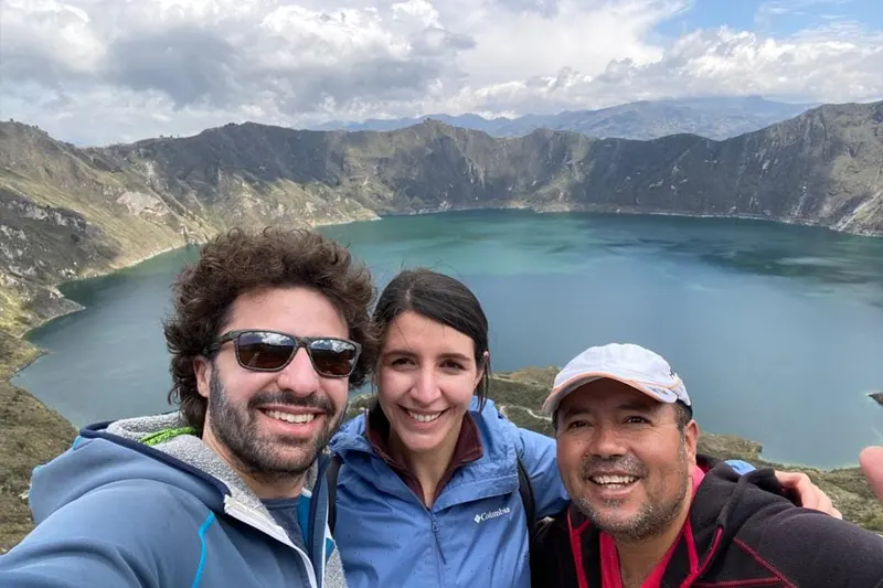 Marco Herrera with travelers at Quilotoa Crater Lake viewpoint, Ecuador