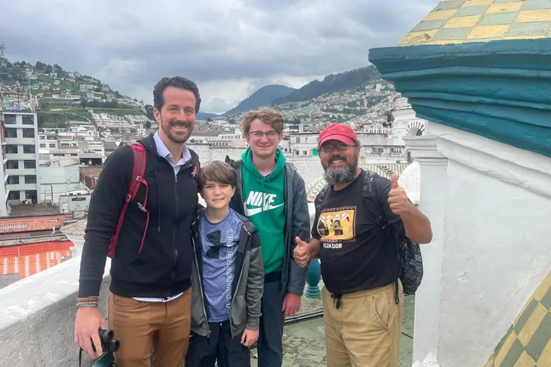 Marco Herrera with travelers at Quito Old Town, Ecuador