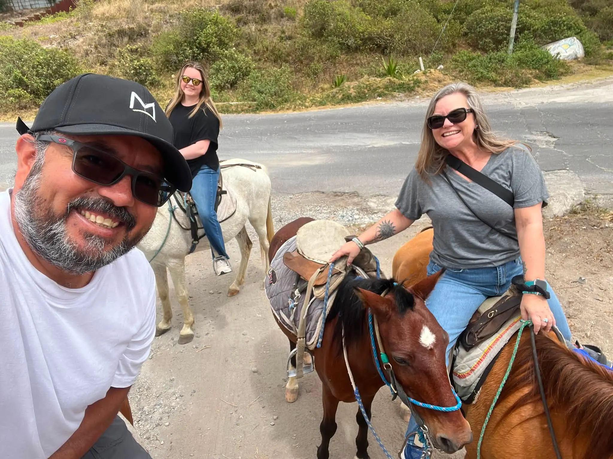 Travelers enjoying horseback riding near Quito and the Middle of the World in Ecuador