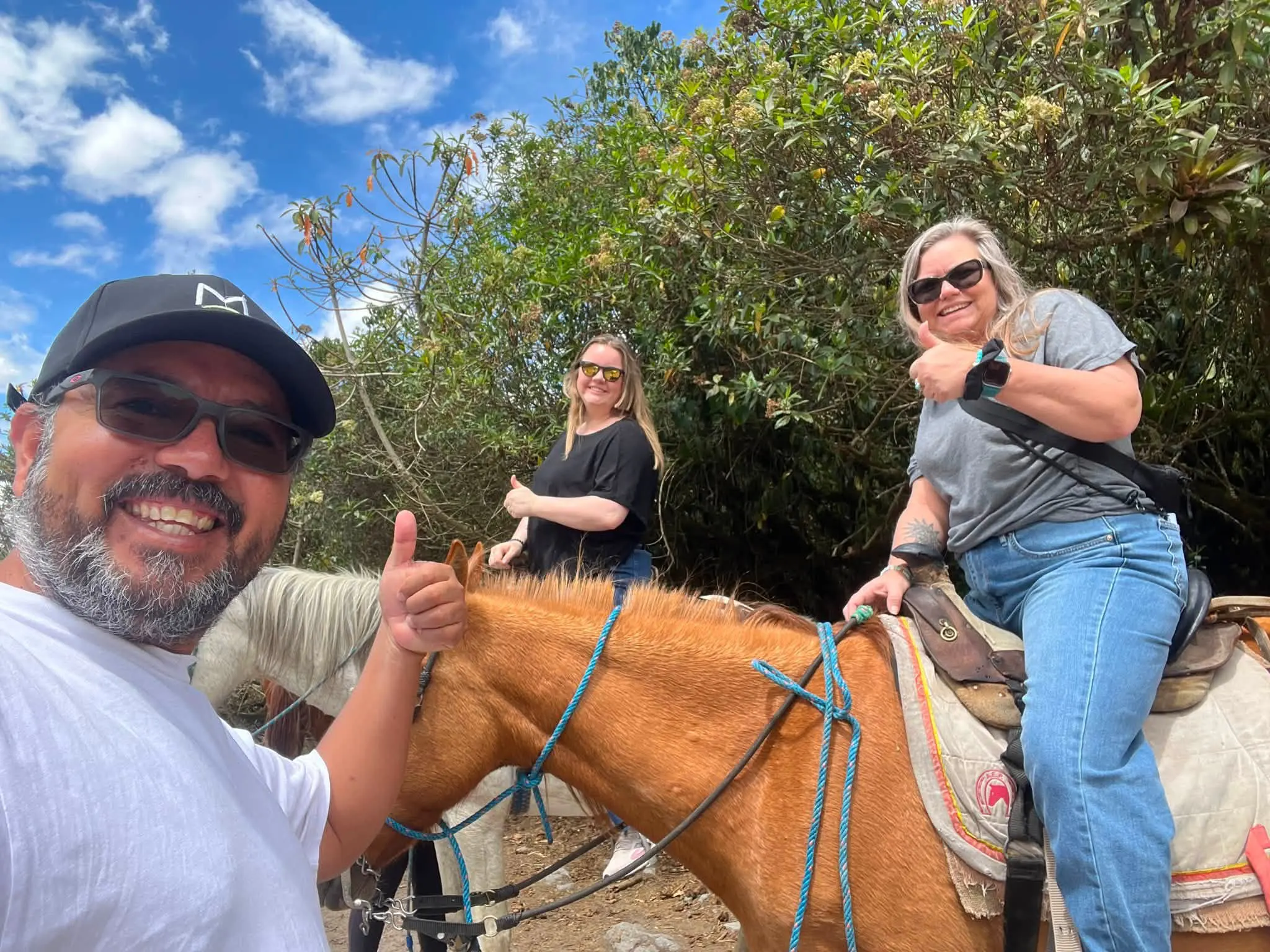 Marco Herrera accompanying travelers during a horseback riding experience near Quito