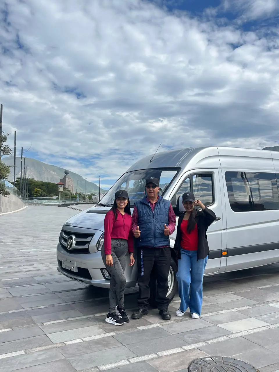 Marco Herrera private tour team in Quito with modern vehicle